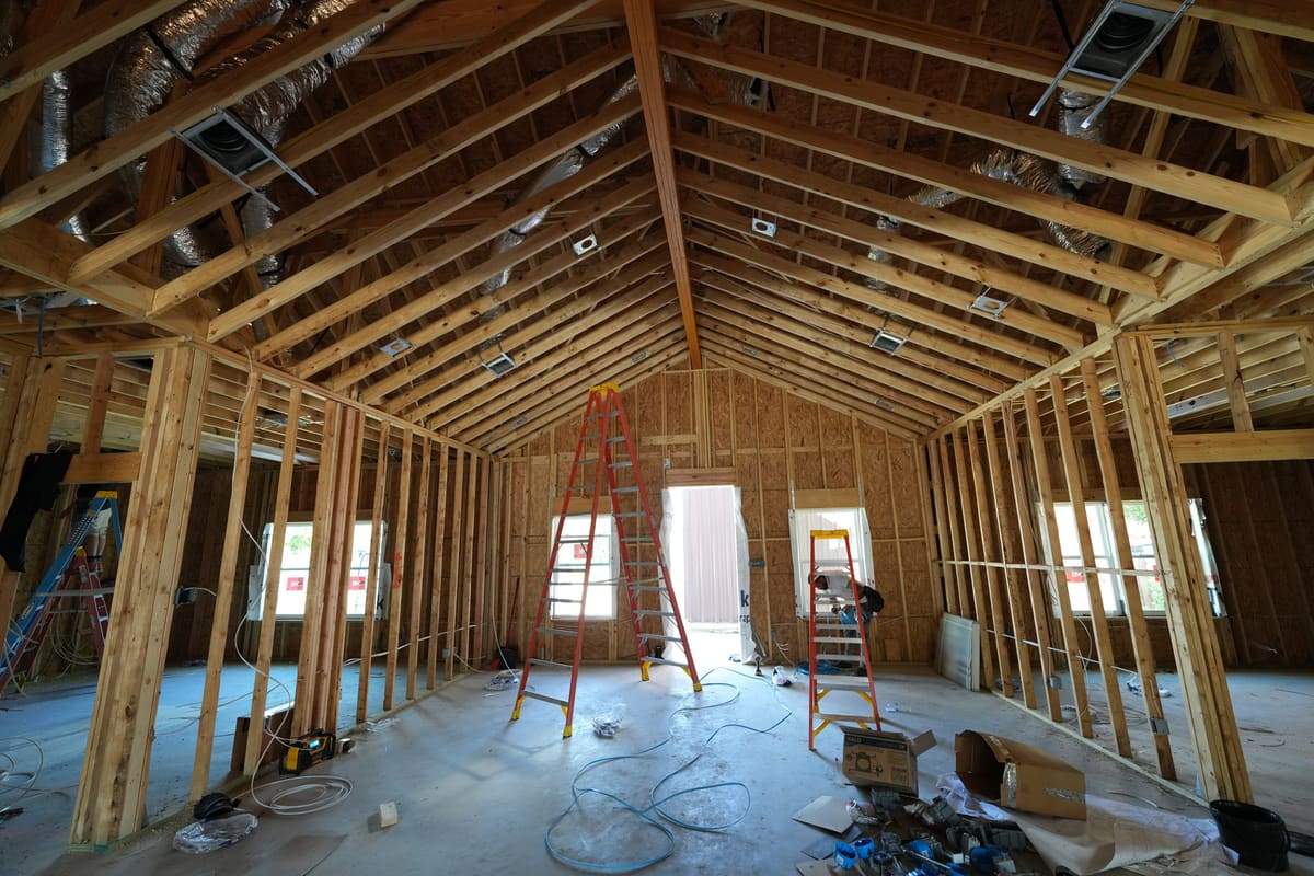 Framed interior with a vaulted ceiling before drywall