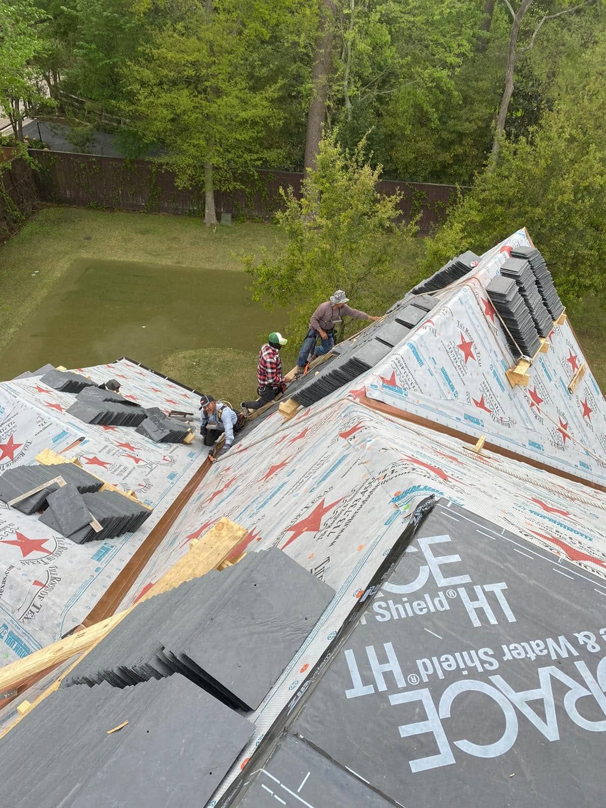 Roof decking covered in ice-and-water shield before shingles go on